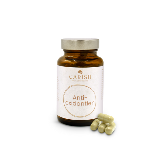 Braune Glasverpackung mit silbernem Deckel und weißem Etikett der Antioxidantien Kapseln gegen oxidativen Stress. Im Vordergrund 4 beige Kapseln zur Ansicht.