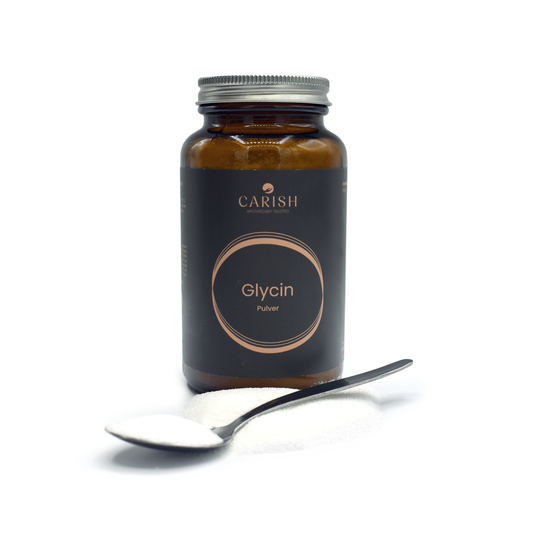 Die dunkelbraune Glasverpackung des Glycin Pulvers zum Abnehmen und im Vordergrund auf einem Löffel das Pulver zur Ansicht.