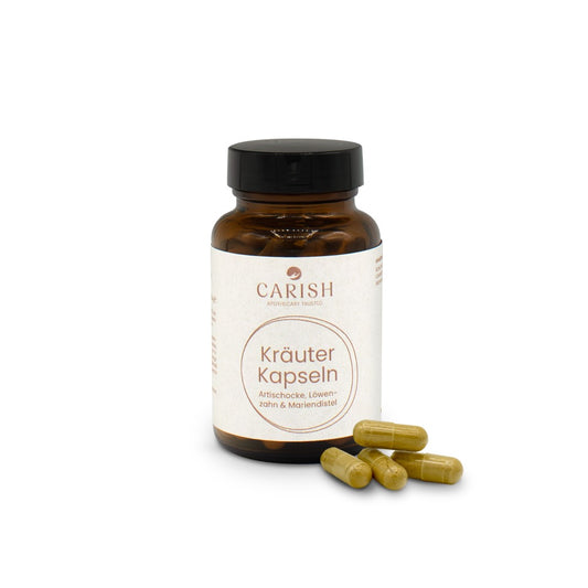 Braune Glasverpackung mit schwarzem Deckel der Kräuterkapseln zur Entgiftung der Leber bei Völlegefühl. Im Vordergrund 4 hellbraune Kapseln zur Ansicht.