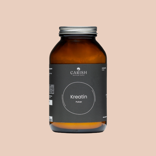 Braune Glasverpackung mit silbernem Deckel und schwarzem Etikett des Kreatinpulvers zum Aufbau von Muskeln.