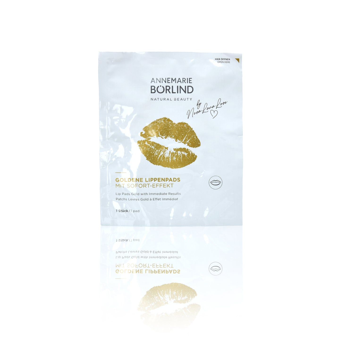 Verpackung der goldenen Lippenpads mit aufgedruckter Produktbeschreibung.