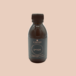 Der Detox Drink in einer dunkelbraunen Glasflasche.