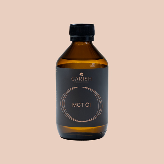 Das MCT Kokosöl in einer braunen Glasflasche mit schwarzem Deckel. 